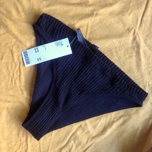 Out From Under Bathing Suit Bottoms